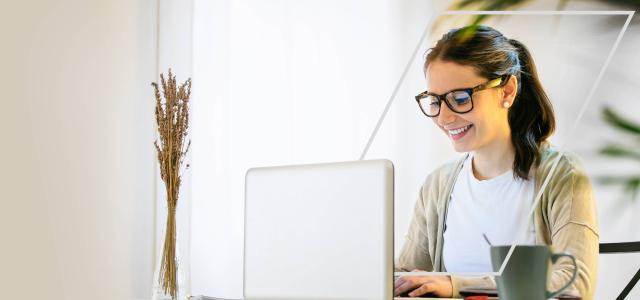 Young woman works on a laptop